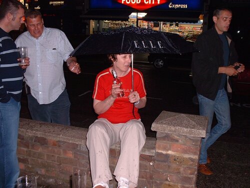 toby's missus ensures his beer remains undiluted by the rain