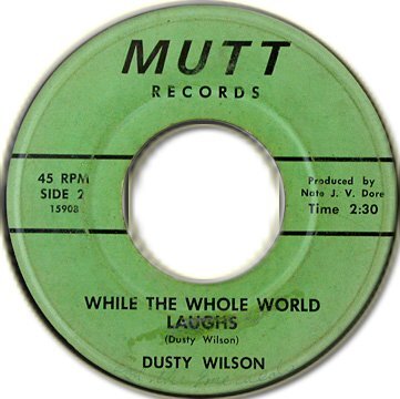 Dusty_Wilson___While_The_Whole_World_Lau