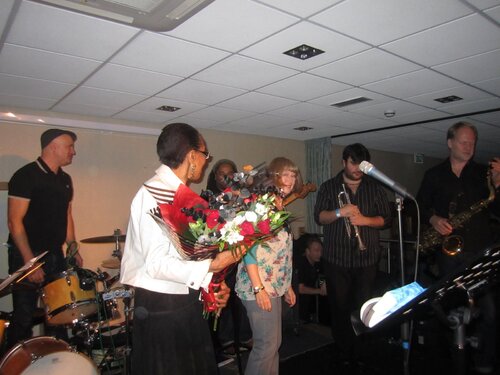 val presenting flowers to debbie