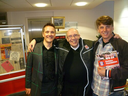 dave evison just arrived, gifts fresh from stoke city fc...with len & jem. original wigan memorabilia in background from jem and al leighton