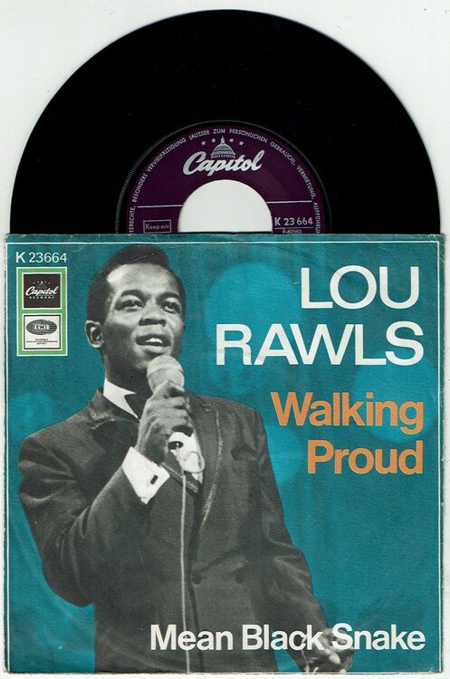 lourawlswalkingproud.jpeg